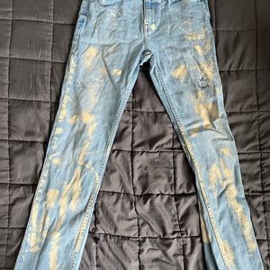 Light blue jeans with paint on them Hollister